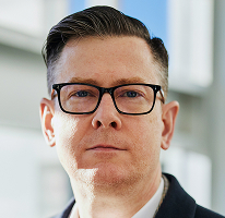 Alexander Hughes, PDG à la tête d'une entreprise de trading crypto, portrait